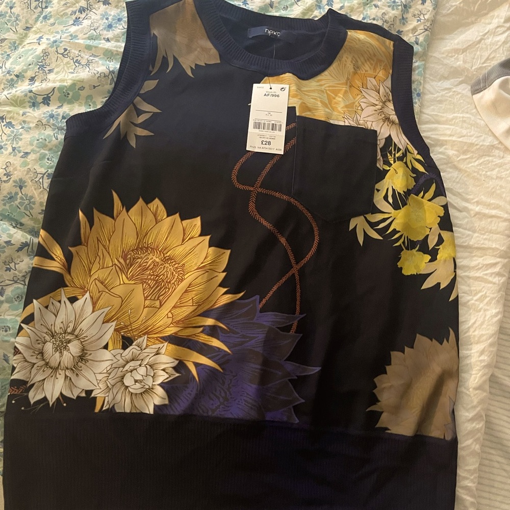 Next sweater vest